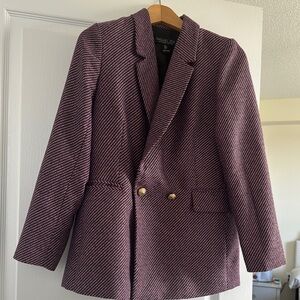 Rachel Zoe Red Sport Coat with Structured Tailoring
100% polyester
Dry clean